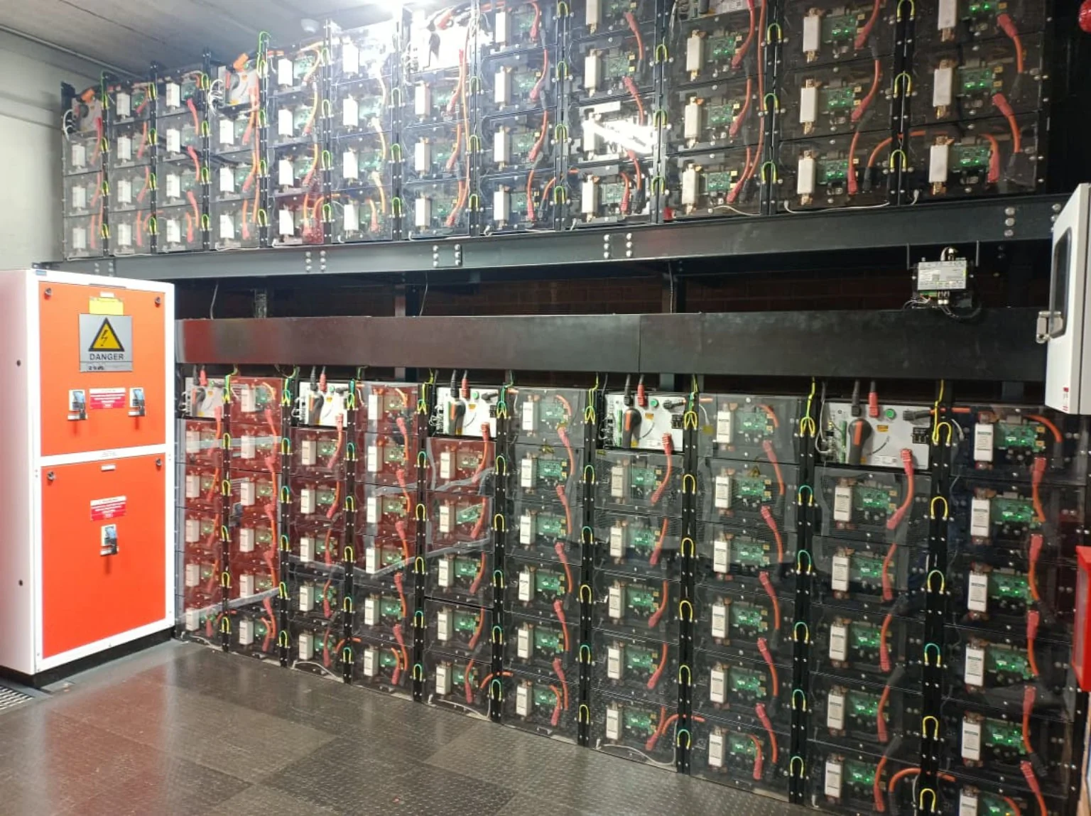 Battery storage racks and electrical distribution installation